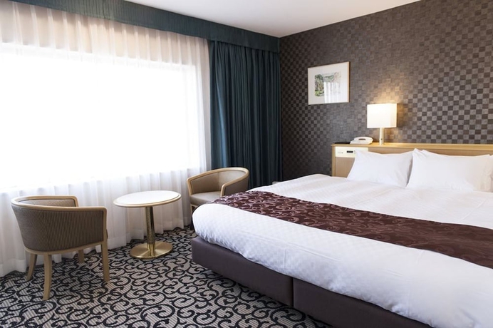 Imagen de la habitación del Hotel Meitetsu Komaki. Foto 7