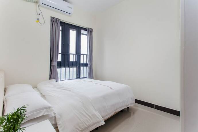 Imagen de la habitación del Hotel Meixu Apartment. Foto 10