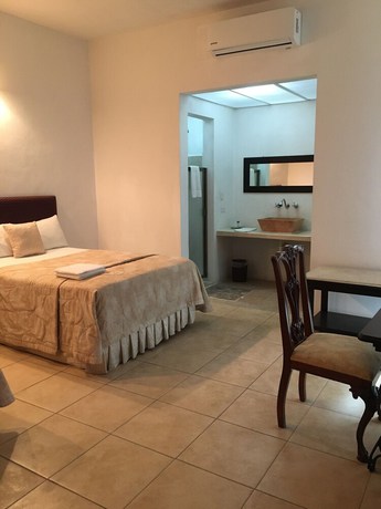 Imagen de la habitación del Hotel Mejorada Merida. Foto 9