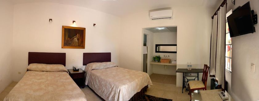 Imagen de la habitación del Hotel Mejorada Merida. Foto 16