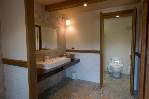 Imagen de la habitación del Hotel Mela Garden Retreat Cottage. Foto 2