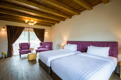 Imagen de la habitación del Hotel Mela Garden Retreat Cottage. Foto 4