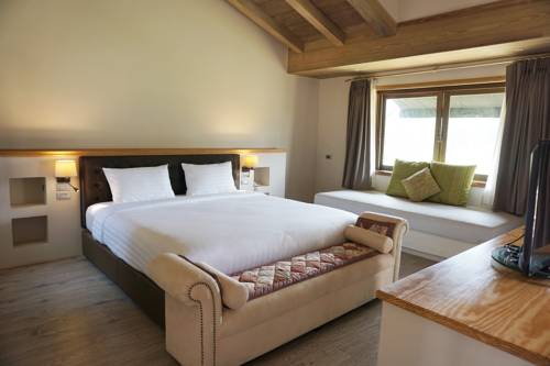 Imagen de la habitación del Hotel Mela Garden Retreat Cottage. Foto 13