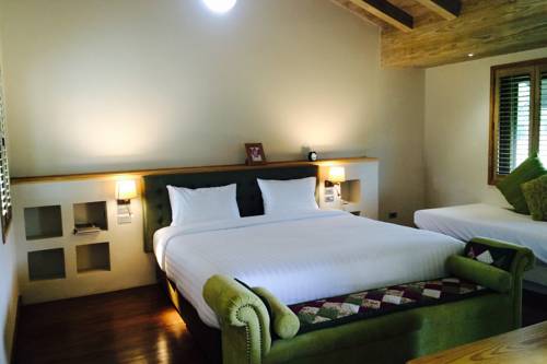 Imagen de la habitación del Hotel Mela Garden Retreat Cottage. Foto 15