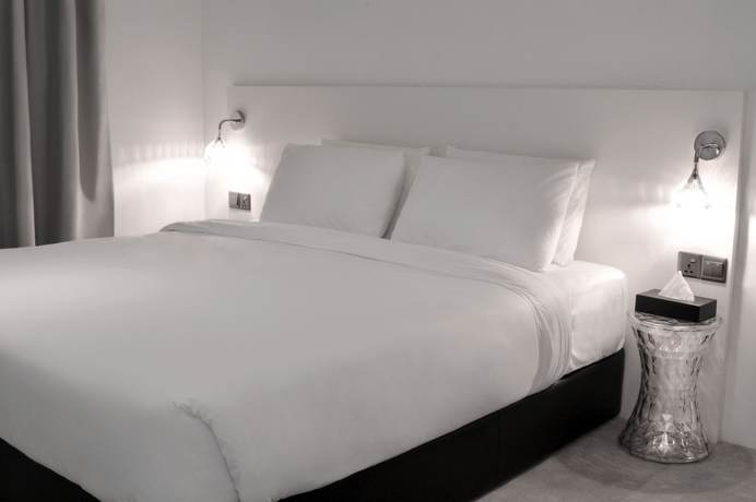 Imagen de la habitación del Hotel Melange Boutique Hotel. Foto 8