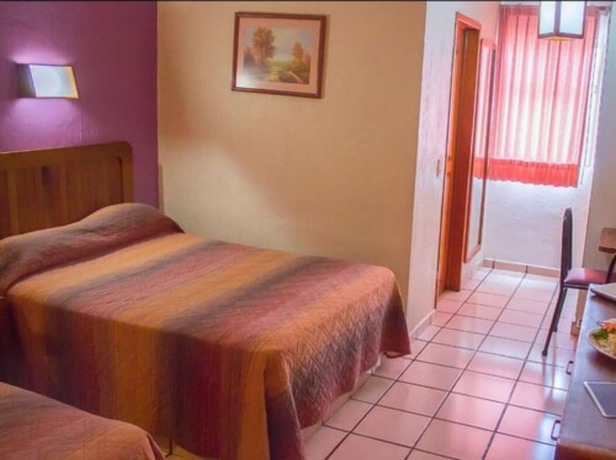 Imagen de la habitación del Hotel Melanie Tepic. Foto 5