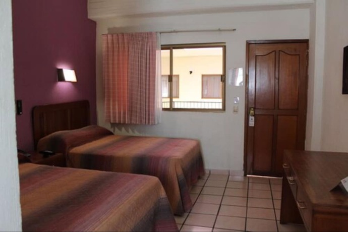 Imagen de la habitación del Hotel Melanie Tepic. Foto 6