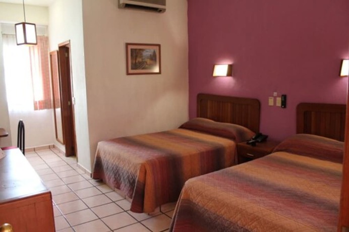Imagen de la habitación del Hotel Melanie Tepic. Foto 10