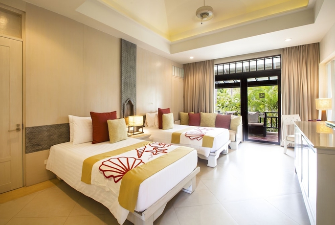 Imagen de la habitación del Hotel Melati Beach Resort and Spa. Foto 16