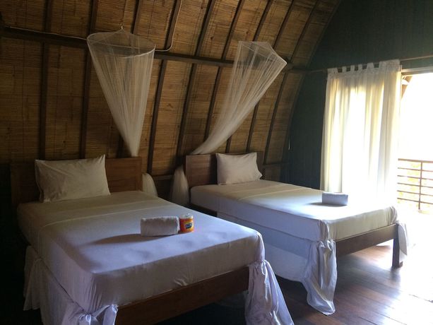 Imagen de la habitación del Hotel Melati Cottage. Foto 4