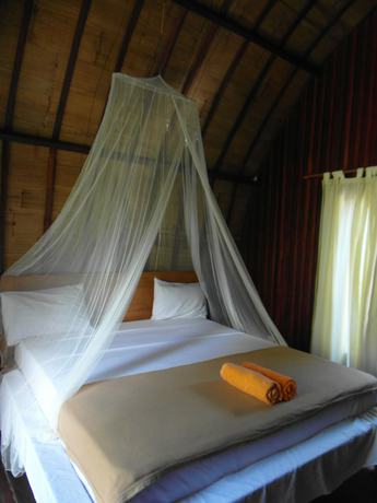 Imagen de la habitación del Hotel Melati Cottage. Foto 5