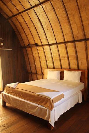 Imagen de la habitación del Hotel Melati Cottage. Foto 6