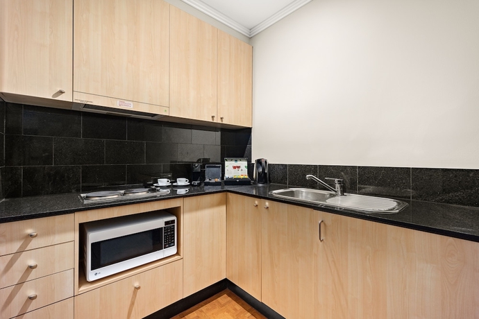 Imagen de la habitación del Hotel Melbourne City Suites. Foto 7