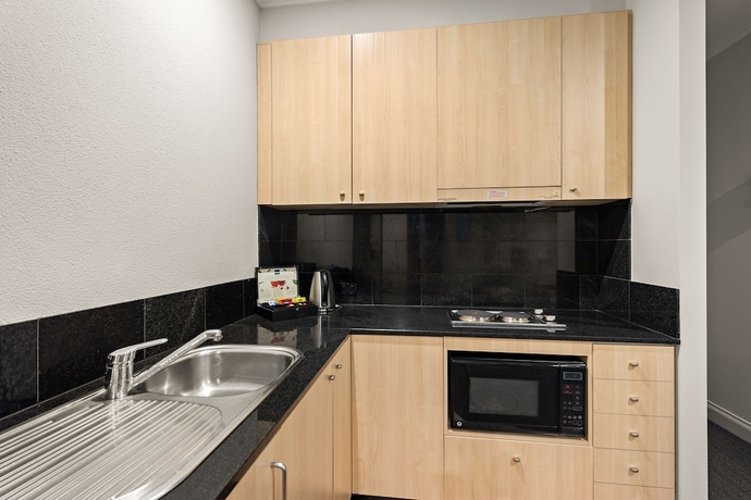 Imagen de la habitación del Hotel Melbourne City Suites. Foto 14