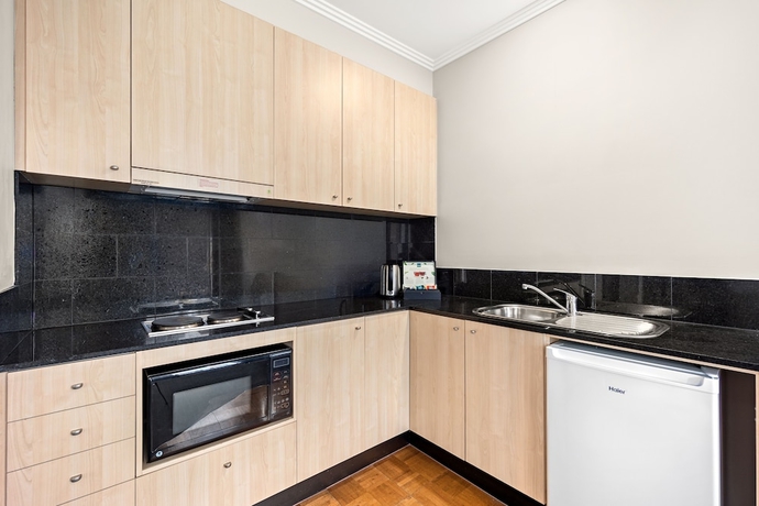 Imagen de la habitación del Hotel Melbourne City Suites. Foto 16