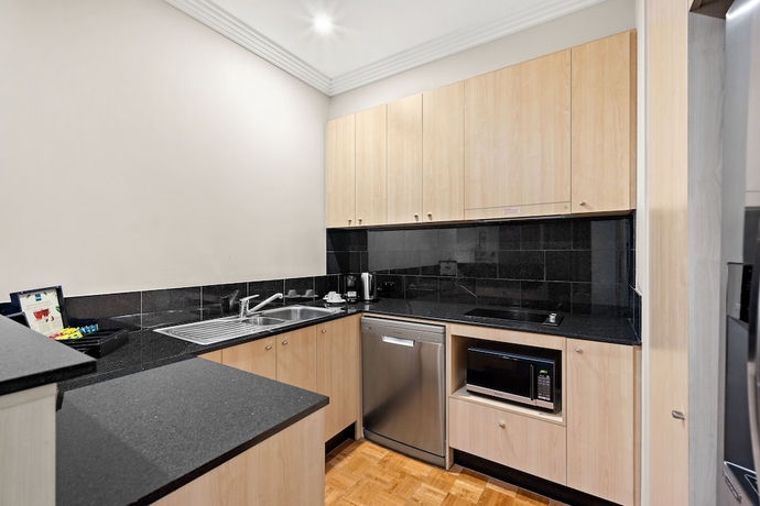 Imagen de la habitación del Hotel Melbourne City Suites. Foto 17