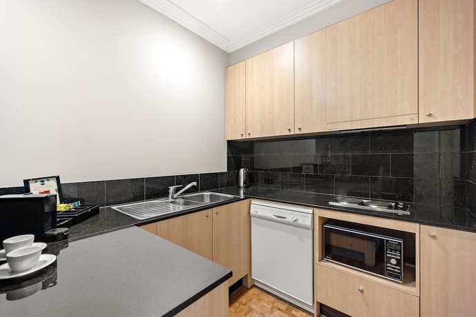 Imagen de la habitación del Hotel Melbourne City Suites. Foto 18