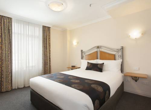 Imagen de la habitación del Hotel Melbourne Metropole Central. Foto 2