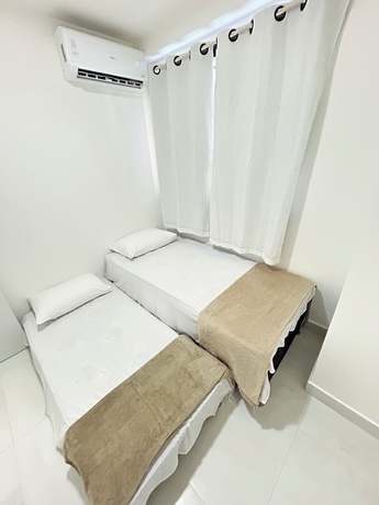 Imagen de la habitación del Hotel Melhores Flats. Foto 2