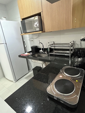 Imagen de la habitación del Hotel Melhores Flats. Foto 11