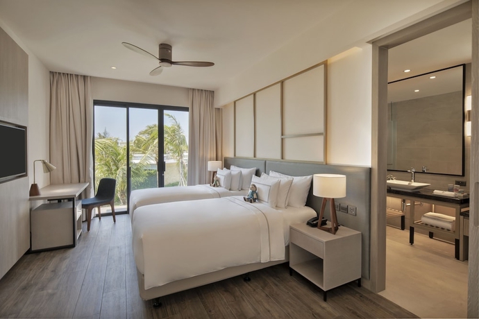 Imagen de la habitación del Hotel Melia Ho Tram Beach Resort. Foto 5