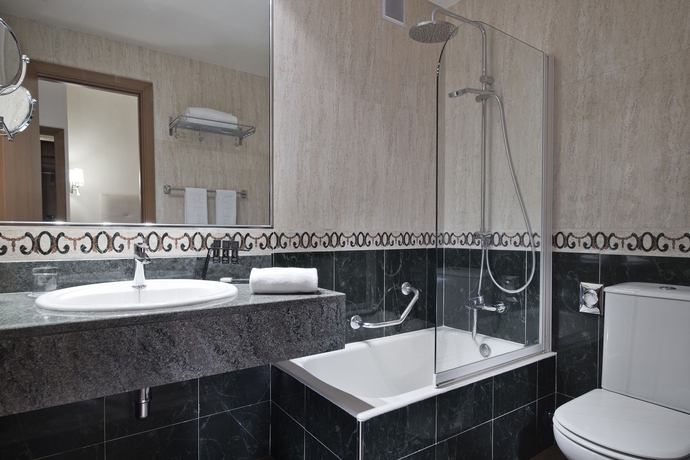 Imagen de la habitación del Hotel Melia Madrid Serrano. Foto 10