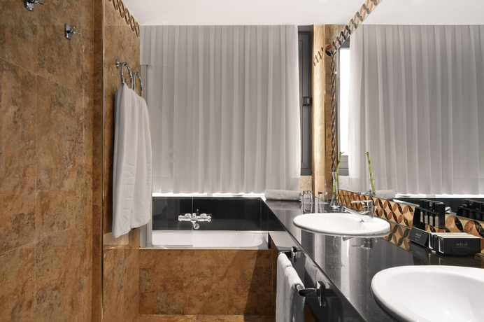 Imagen de la habitación del Hotel Melia Madrid Serrano. Foto 14