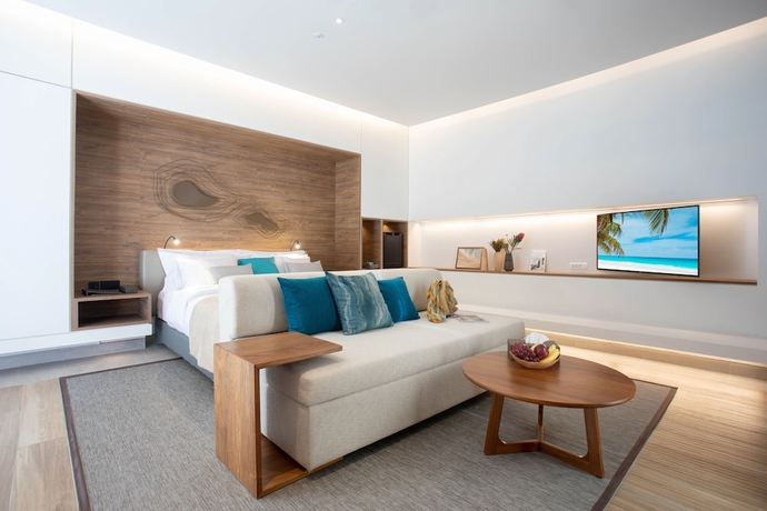 Imagen de la habitación del Hotel Melia Phuket Mai Khao. Foto 11