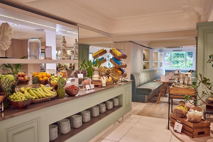 Imagen del bar/restaurante del Hotel Melia White House. Foto 3