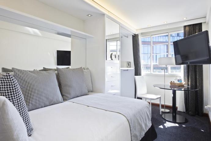 Imagen de la habitación del Hotel Meliá White House Apartments. Foto 9