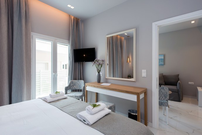 Imagen de la habitación del Hotel Melina Bay Boutique. Foto 12