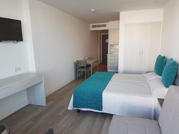 Imagen de la habitación del Hotel Melini Suites. Foto 2