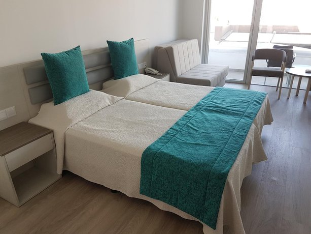 Imagen de la habitación del Hotel Melini Suites. Foto 4