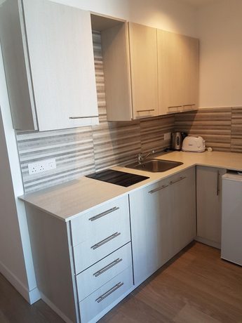 Imagen de la habitación del Hotel Melini Suites. Foto 5