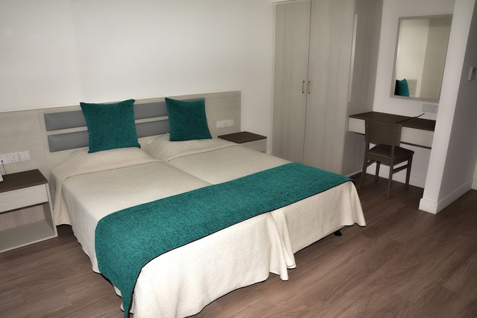 Imagen de la habitación del Hotel Melini Suites. Foto 7