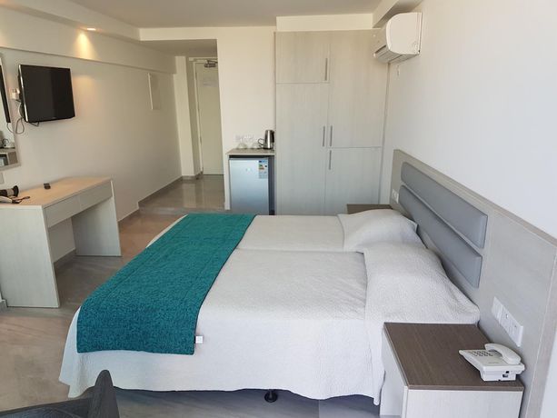 Imagen de la habitación del Hotel Melini Suites. Foto 8