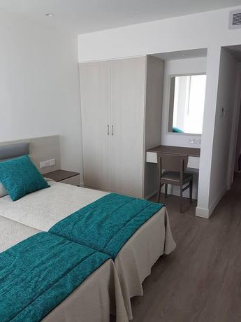 Imagen de la habitación del Hotel Melini Suites. Foto 10
