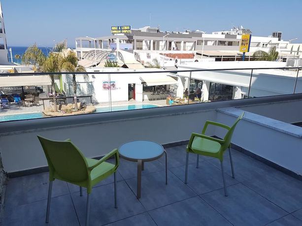 Imagen de la habitación del Hotel Melini Suites. Foto 12