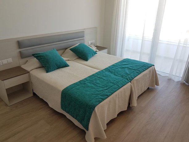 Imagen de la habitación del Hotel Melini Suites. Foto 14