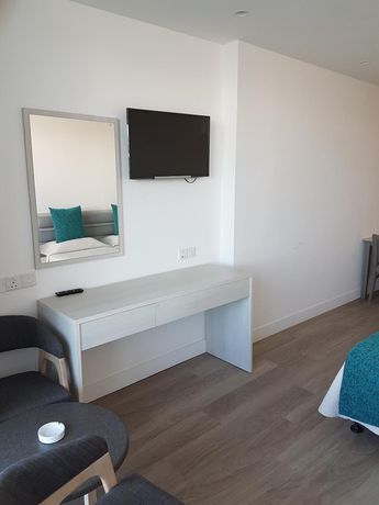 Imagen de la habitación del Hotel Melini Suites. Foto 15