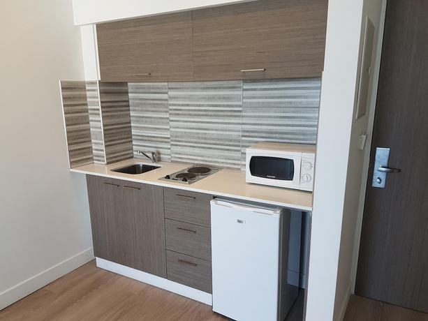 Imagen de la habitación del Hotel Melini Suites. Foto 16