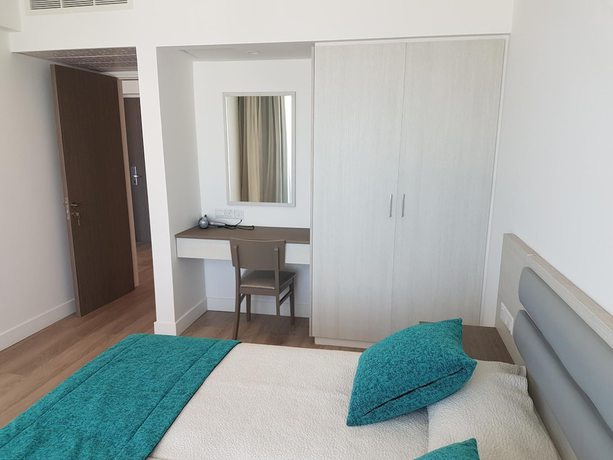 Imagen de la habitación del Hotel Melini Suites. Foto 17