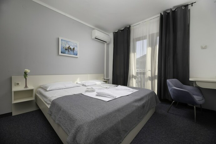 Imagen de la habitación del Hotel Meliores Rooms and Restaurant. Foto 18