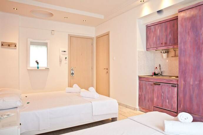 Imagen de la habitación del Hotel Melissanthi. Foto 28