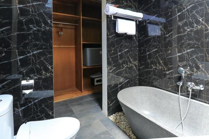 Imagen de la habitación del Hotel Mella Villas Jimbaran. Foto 2