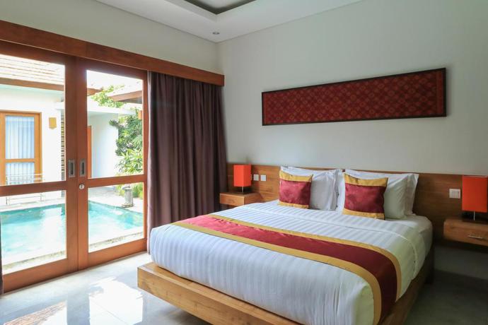 Imagen de la habitación del Hotel Mella Villas Jimbaran. Foto 3