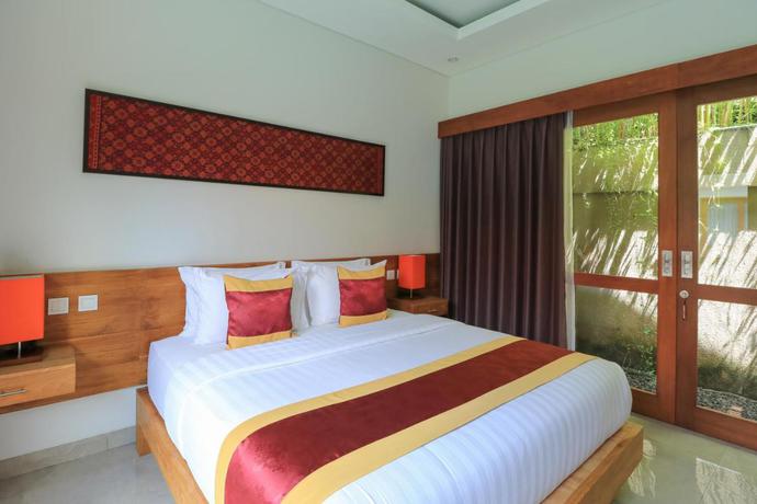Imagen de la habitación del Hotel Mella Villas Jimbaran. Foto 4
