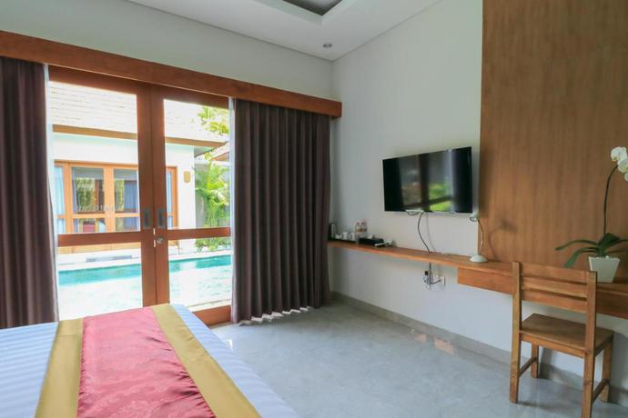 Imagen de la habitación del Hotel Mella Villas Jimbaran. Foto 5