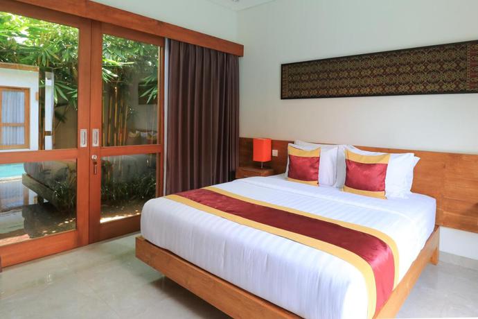 Imagen de la habitación del Hotel Mella Villas Jimbaran. Foto 6