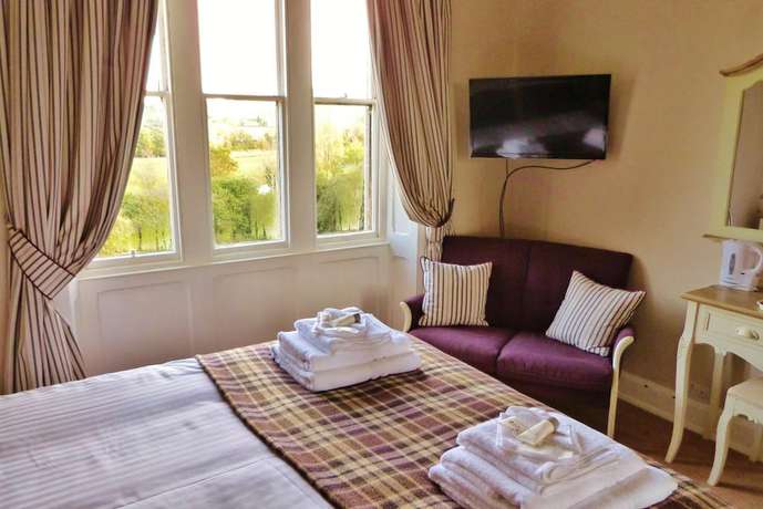 Imagen de la habitación del Hotel Mellington Hall Country House. Foto 18